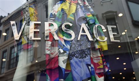 mk buys out versace|versace jeans uk.